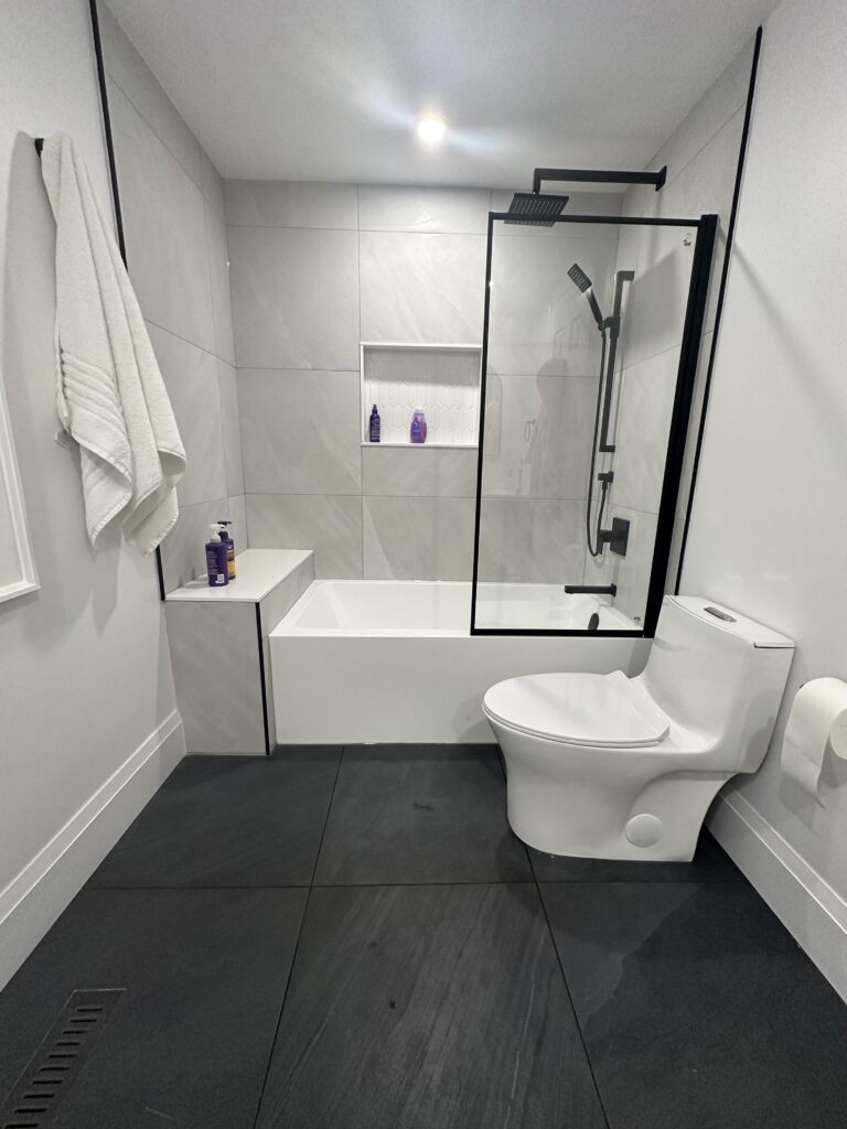 Finished bathroom remodel with modern shower and vanity