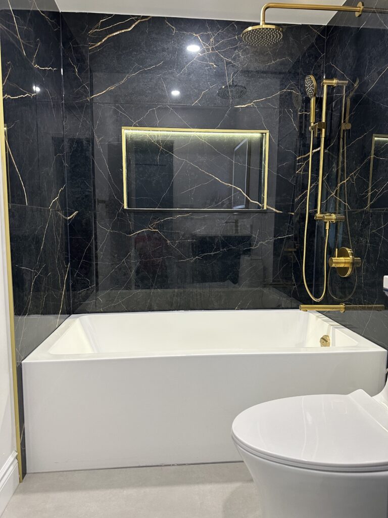 Modern bathroom fixtures and carefully finished tile details